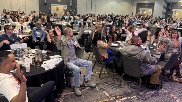 2026 Annual Conference Plenary Session Attendees Waving Hands Expressing Joy