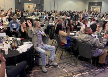 2026 Annual Conference Plenary Session Attendees Waving Hands Expressing Joy