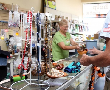 Thrift Shop Volunteer Spreading Cheer