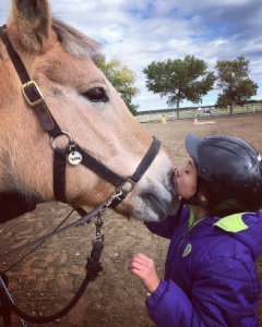 Loving her therapy horse