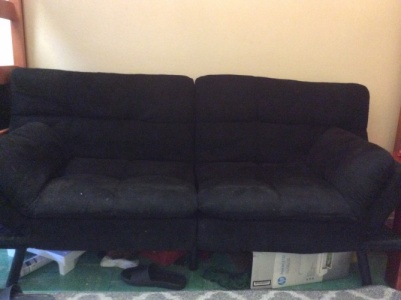 A black memory foam futon